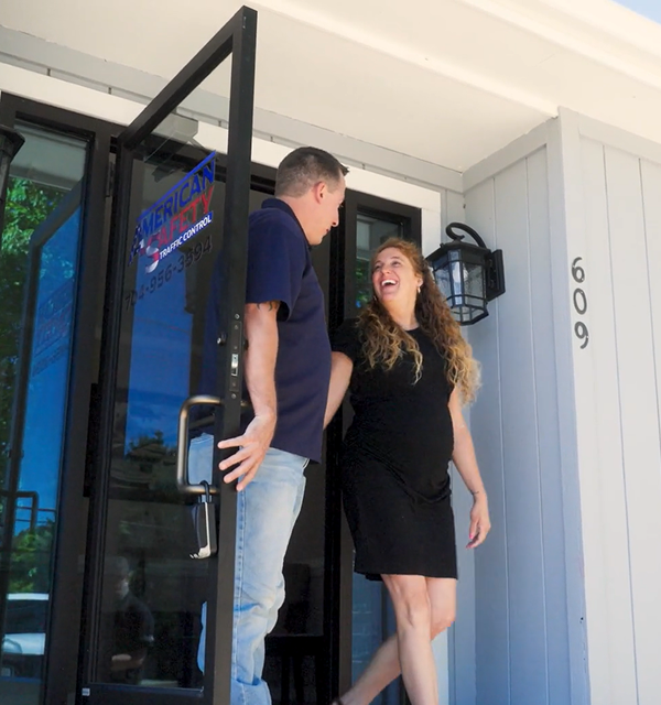 Actual client of the Cogent Analytics business consulting firm. Young lady is coming out the door with owner holding it.