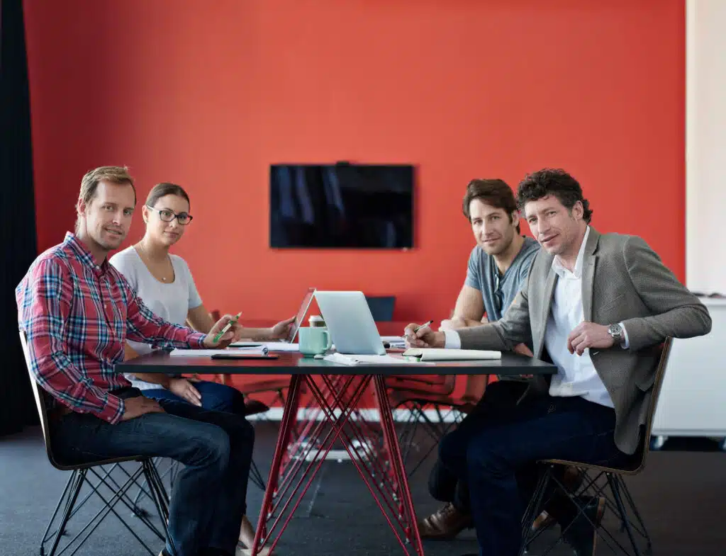 A group of colleagues having a meeting about cloud computing in a boardroom