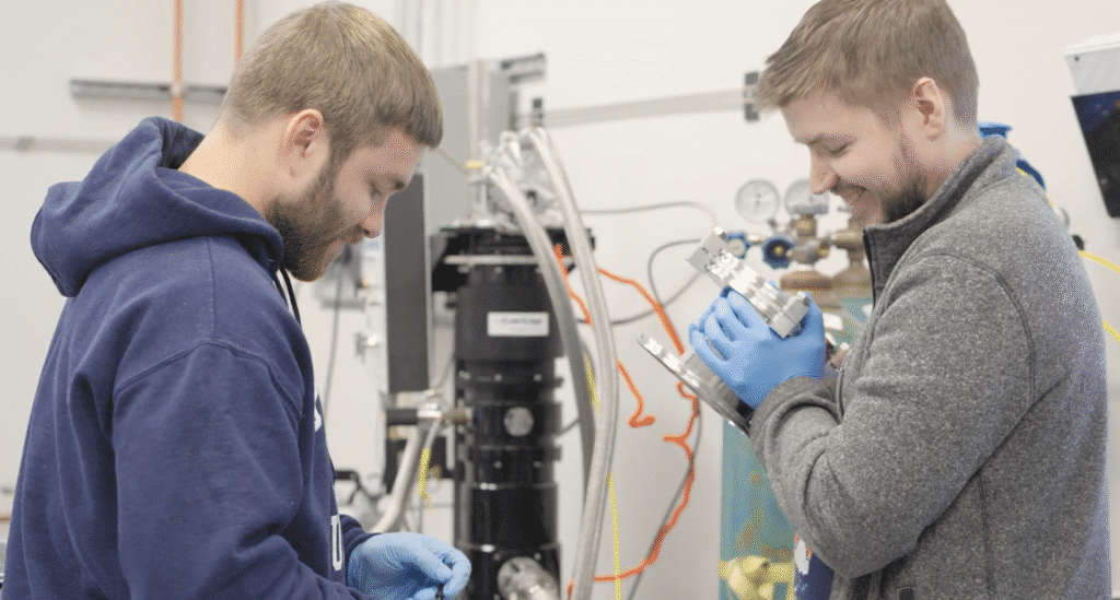 Cold Edge Technologies, Allentown, PA. 2 guys by the machine working