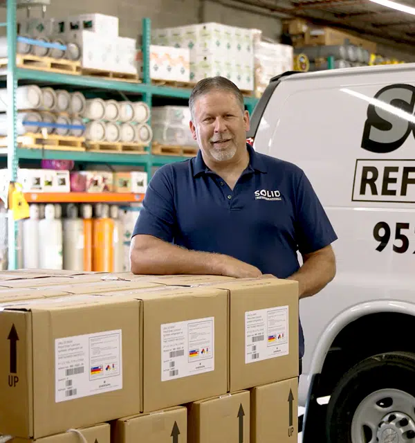 Solid Refrigeration client standing by van - Cogent Analytics case study