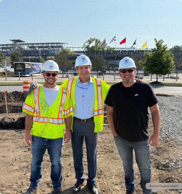 Career development at Cogent Analytics. 3 guys in hard hats smiling for pic