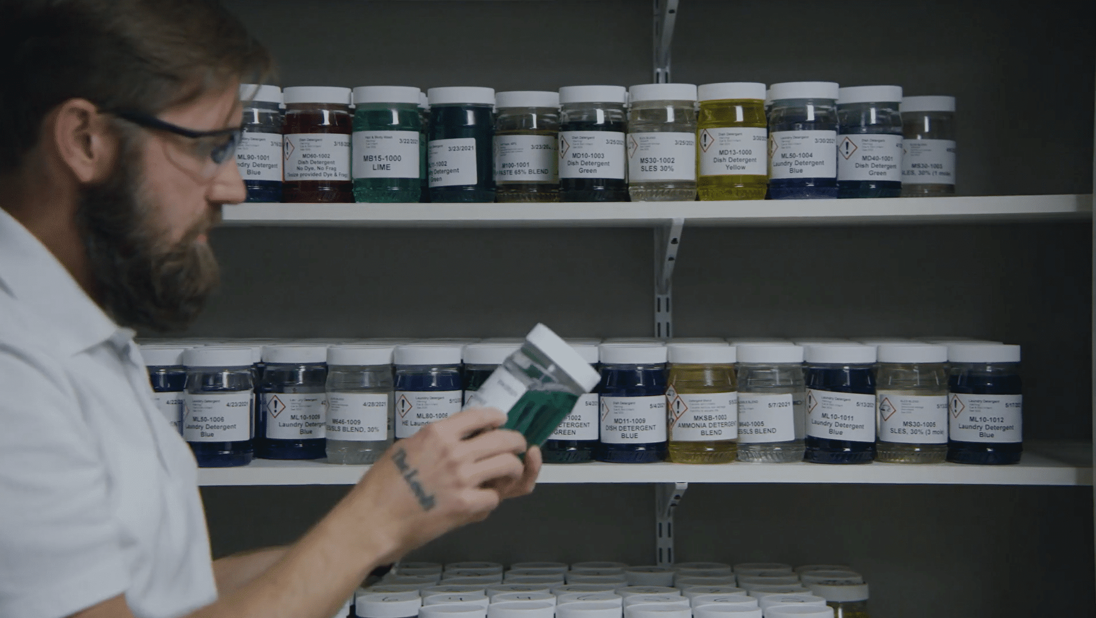 Chemical manufacturer examining chemical inventory