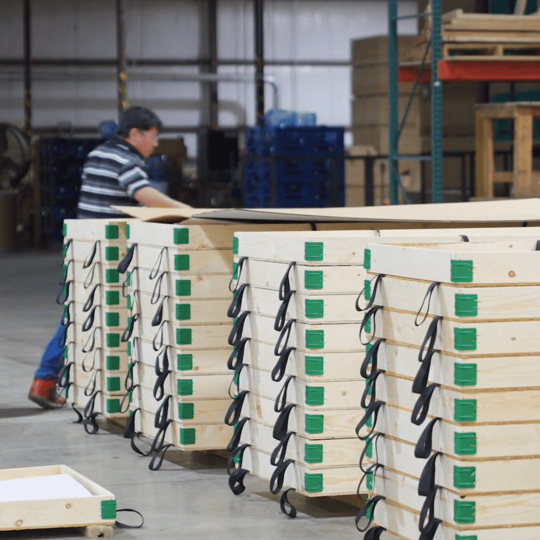 A warehouse with wooden pallets