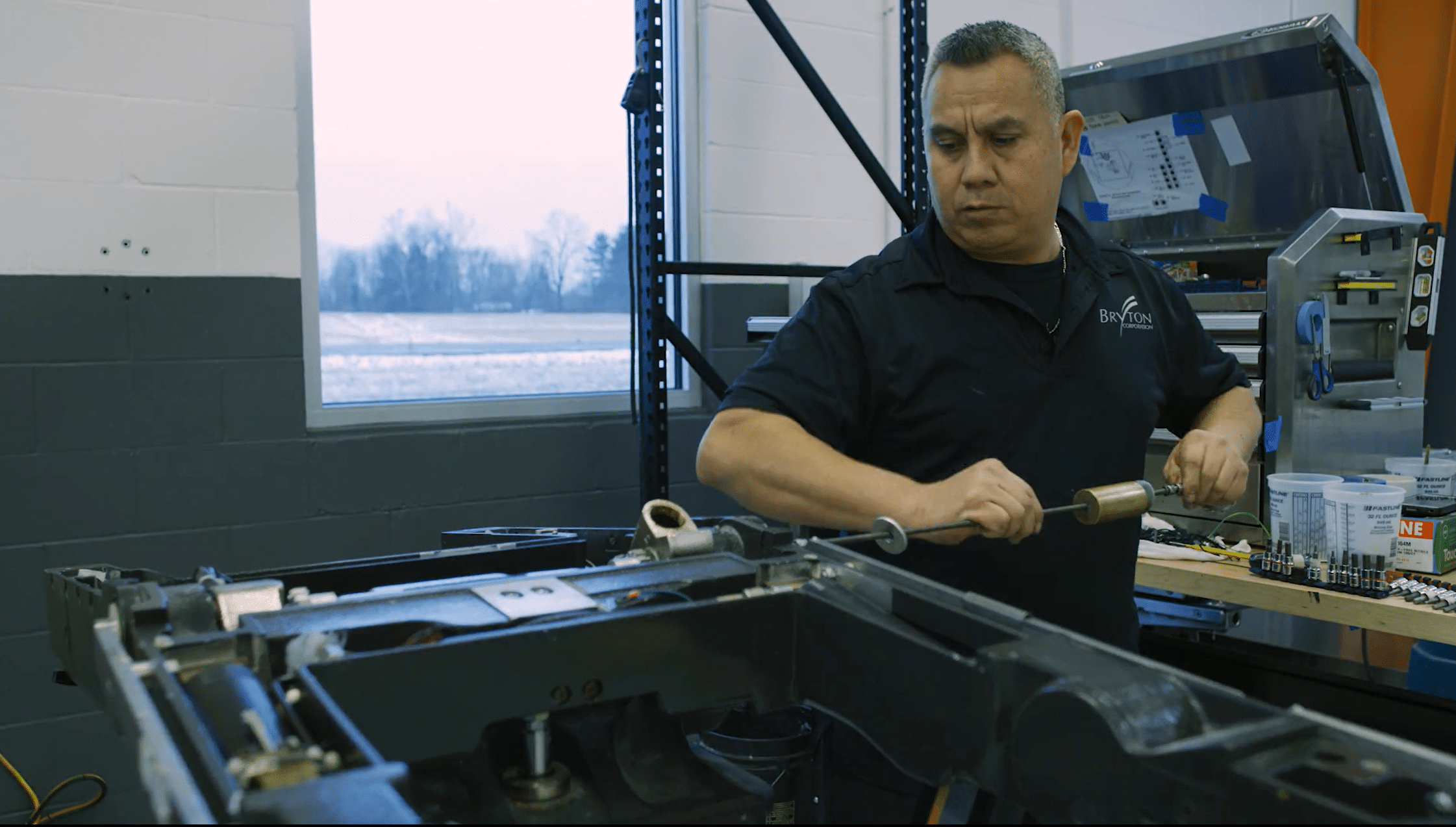 An employee working on a machine